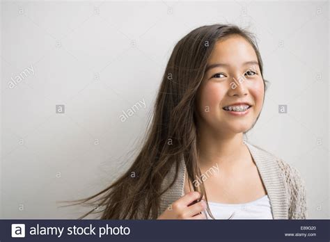 Smiling Brunette Girl With Braces Hi Res Stock Photography And Images Alamy