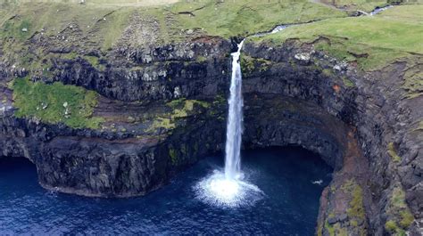 One Of The Most Popular Landmarks In The Faroe Islands Gásadalurs