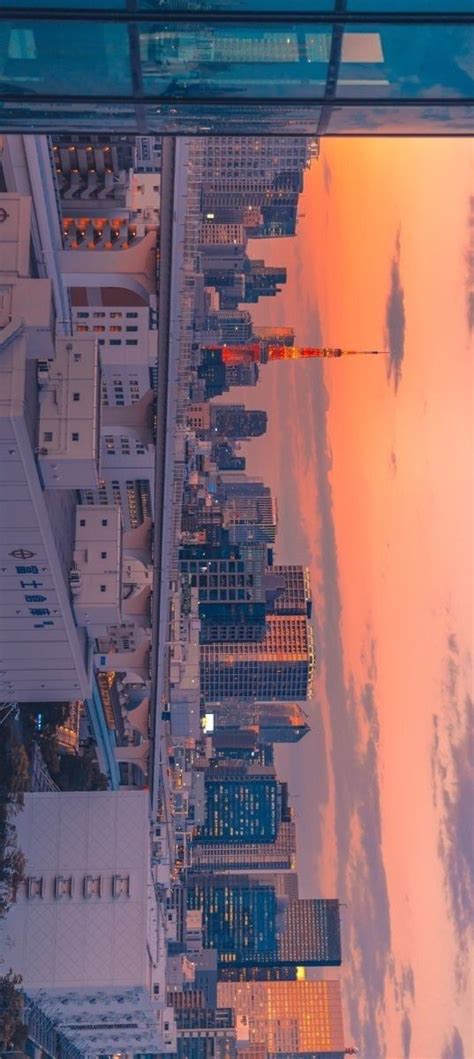 An Aerial View Of The City At Sunset