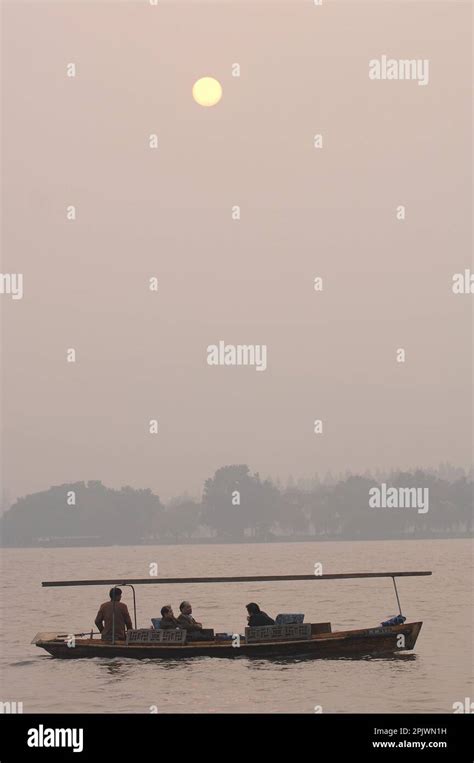 Boats At Dusk On The Lake From Gu Hill Aka Gu Shan Island Zheijiang