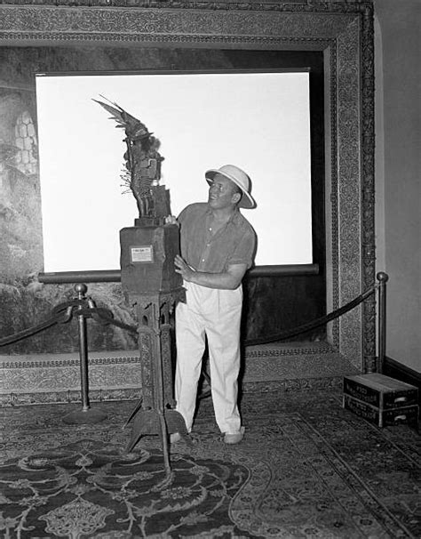 Robert Ripley Posing with Lion Pictures | Getty Images