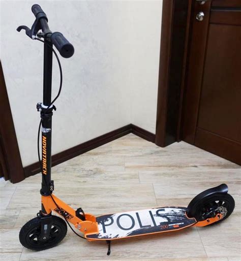 Самокат Novatrack Polis 200DB оранжевый с дисковым тормозом купить в ...