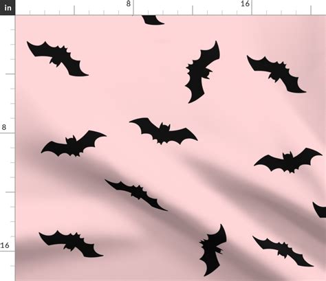 Black bats on pale pink background. Fabric | Spoonflower