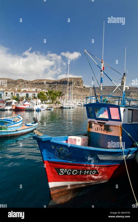 Gran Canaria Fishing Boats Moored In Puerto De Mogan Harbour With