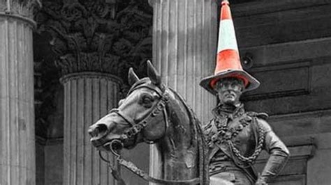 Why Do People Put Traffic Cones On Statues Bbc News