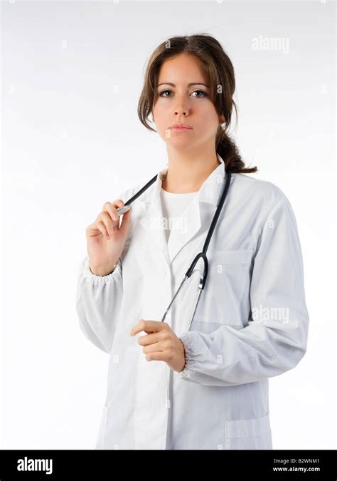 Cute Brunette In White Medical Gown And A Stethoscope Stock Photo Alamy