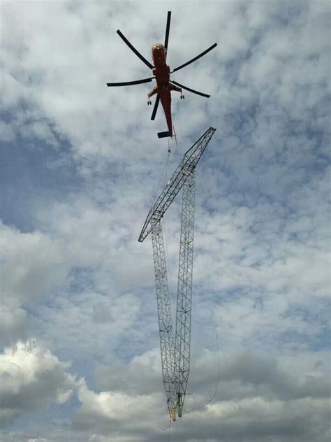 Air Crane Bringing In A Tower Pole Climbing Pole Utility Pole