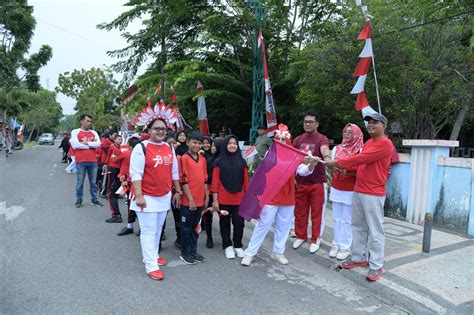 Meriahkan HUT Ke 78 RI SDN 4 Gelar Jalan Santai Keluarga