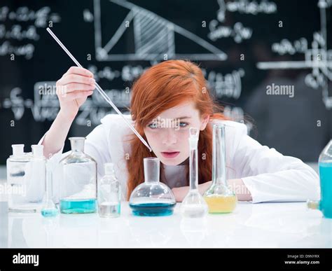 General View Of A Student Girl Conducting A Laboratory Experiment On A