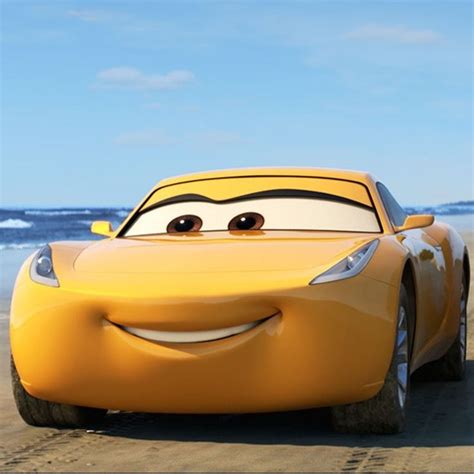 The Character Cars Are Driving Along The Beach