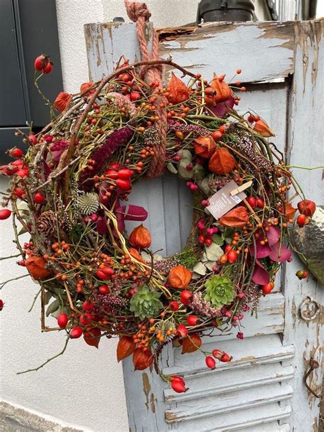 An Old Door With A Wreath On It