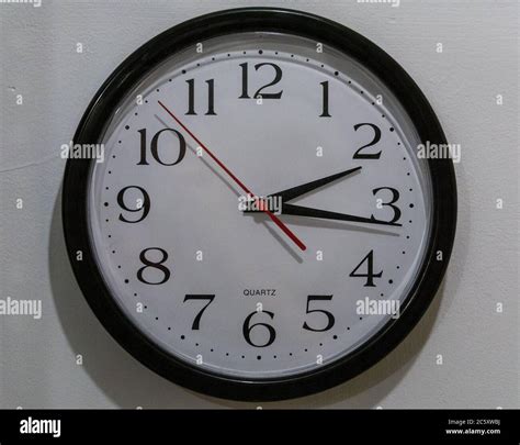 Analog Clock showing the time is 2:16 and 53 seconds Stock Photo - Alamy