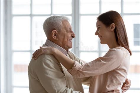 Loving Mature Dad Cuddle Kiss Adult Daughter Stock Image Image Of Parent Grownup