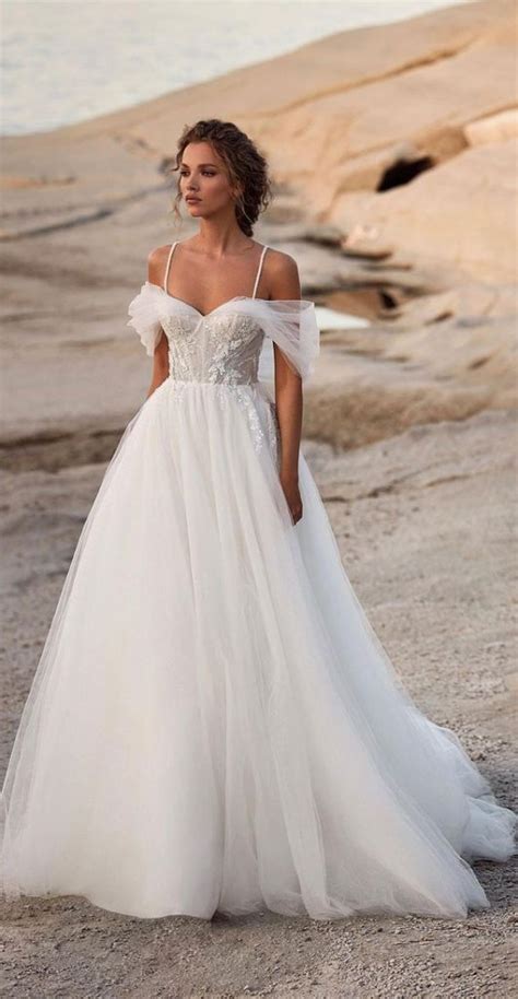 Timeless Wedding Dresses To Lookout Wings Sleeves Fairy Tale Vibe