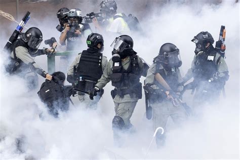 Photos Hong Kong Riot Police Lay Siege To University Occupied By