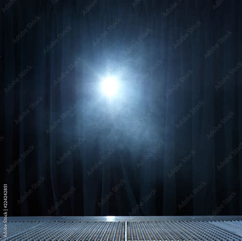 Spotlight shining on curtain Stock Photo | Adobe Stock