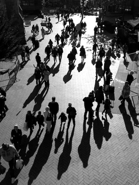 Premium Photo High Angle View Of People Walking On Street