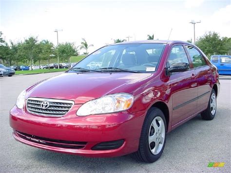 Impulse Red Pearl 2007 Toyota Corolla LE Exterior Photo 38650990