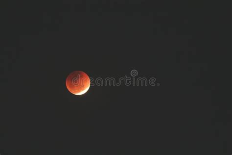 Beautiful Shot Of Red Moon In The Dark Sky Stock Photo Image Of