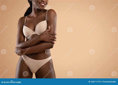 Slim Dark Skinned Woman In Underwear Demonstrating Her Perfect Body