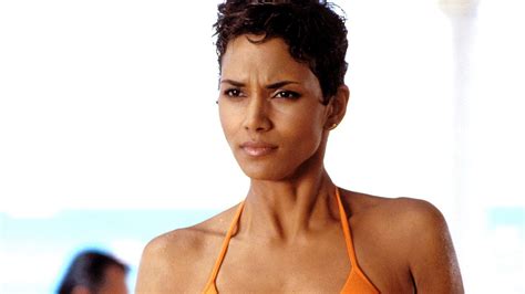 Halle Bailey Re Creates Halle Berry S Bond Girl Orange Bikini Look For