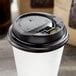 Choice Black Hot Paper Cup Travel Lid With Hinged Tab For 10 24 Oz Standard Cups And 8 Oz