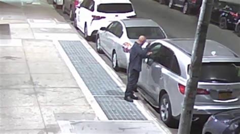 Police Man Caught On Video Breaking Into Car In Queens Cbs New York