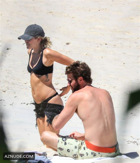 Miley Cyrus Wears A Black Bikini At The Beach In Byron Bay Australia AZNude