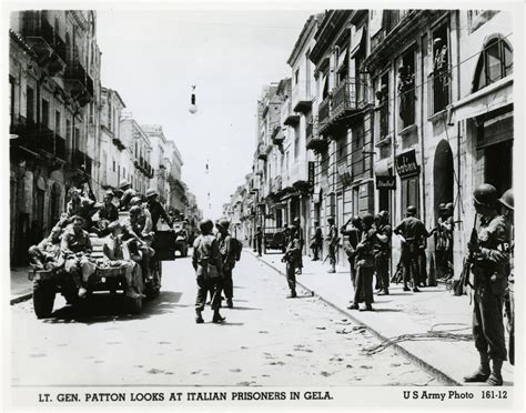 Us Army Lt Gen George Patton Examining Italian Prisoners Of War In