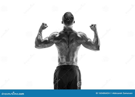 Bodybuilder Montrant Son Dos Et Ses Muscles Biceps Isolés Sur Un Wh