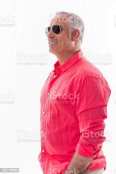 Smiley Happy Man Standing In Studio Stock Photo Download Image Now