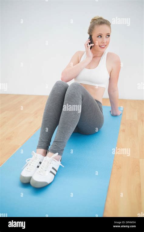 Happy Sporty Blonde Phoning Stock Photo Alamy