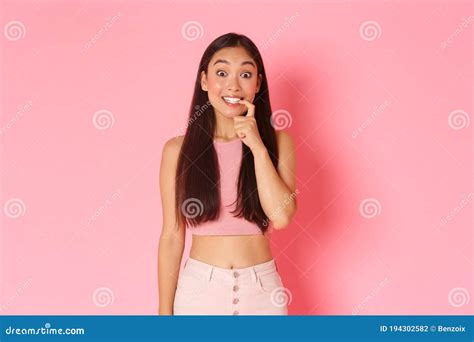 Portrait Of Tempting Coquettish Lady Bite Lip Look Blank Space On Pink Background Stock Image