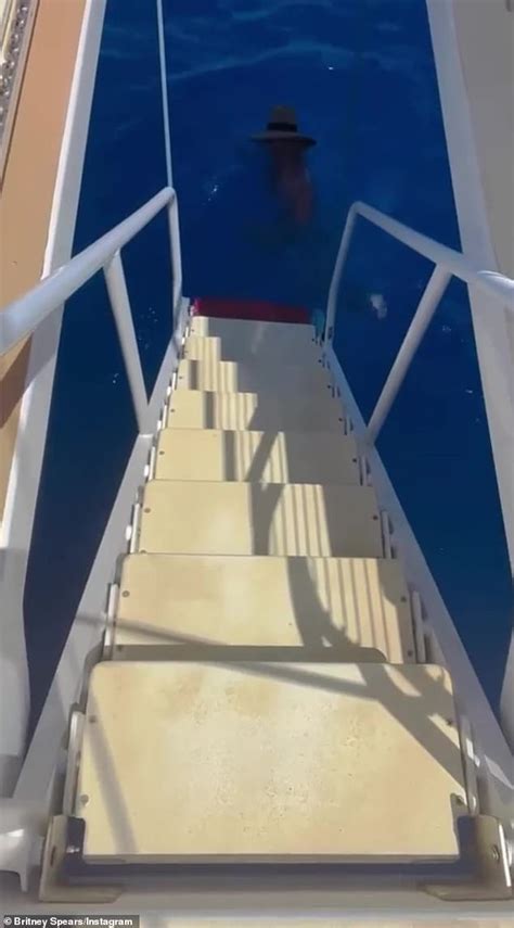 Britney Spears Shows Off Her Toned Legs While Modeling A Skimpy Red Hot Mini Dress Daily Mail