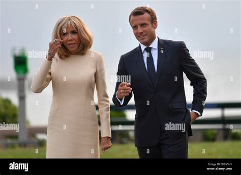 French President Emmanuel Macron And His Wife Brigitte Trogneux At The