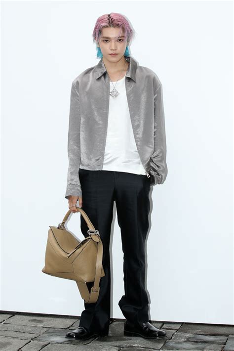 NCT's Taeyong Shines in Silver Satin Jacket at Loewe Fall Presentation