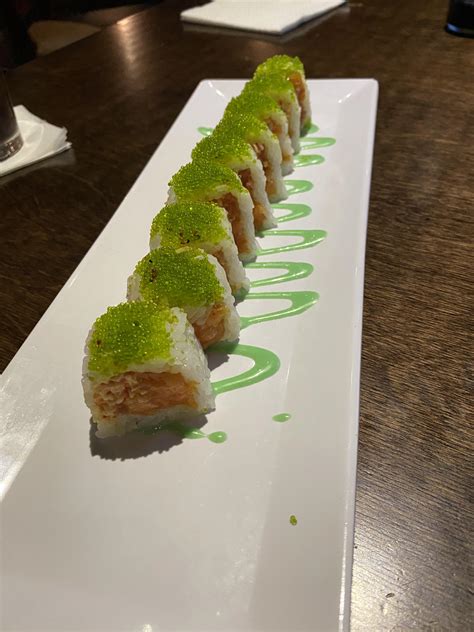 “love At First Bite” Roll Spicy Tuna Spicy Salmon Spicy Crab With Wasabi Cream And Tobiko Sushi