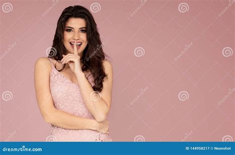 Attractive Brunette Girl In Pink Dress Stock Image Image Of Beautiful Finger 144958217