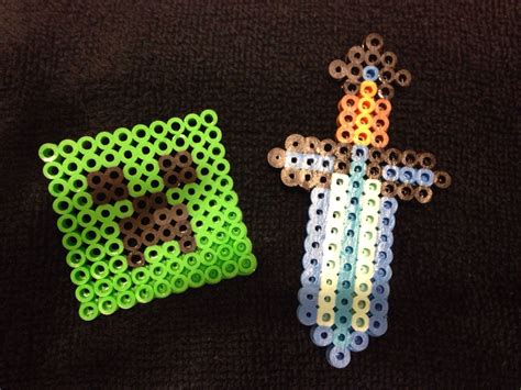 Perler Beads Made Necklaces Out Of Swords And Pins Out Of Creeper