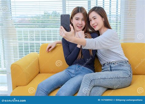 A Couple Of Beautiful Asian Woman Take Photo While Smiling Same Sex