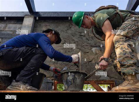 U S Marine Corps Cpl Connor Huften Right A Combat Engineer With