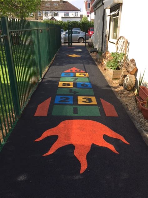 rubber playground flooring colourful children – Wet Pour Rubber