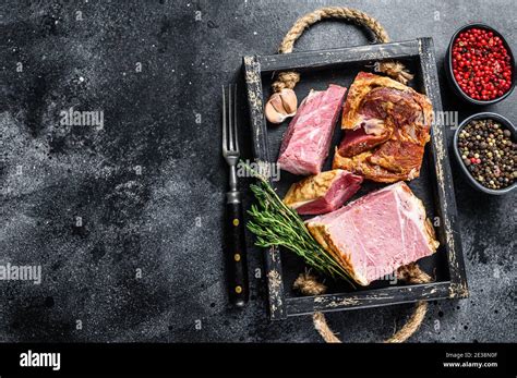 Smoked Sliced Pork Slab Bacon Meat In A Wooden Tray Black Background Top View Copy Space