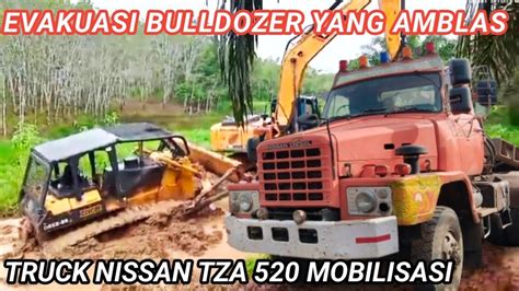 Evakuasi Bulldozer Yang Amblas Truck Nissan Tza 520 Tukang Gendong