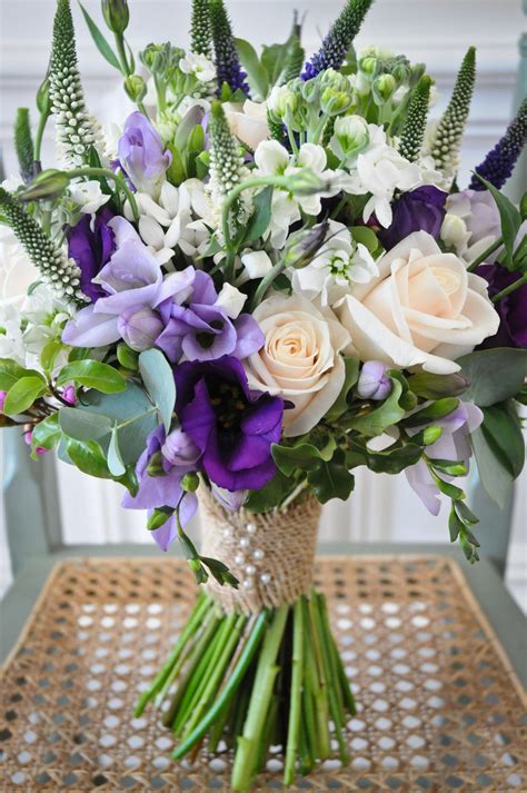 Lilac And Purple Freesias With White Bouvardia And Cream Roses For A