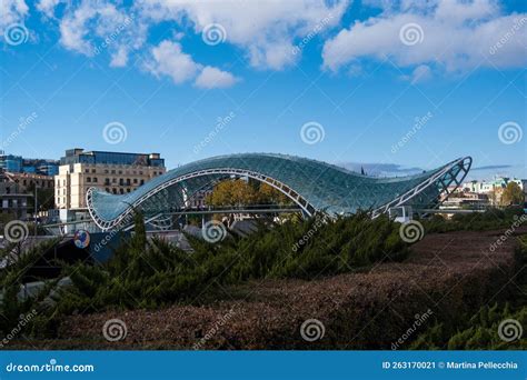 Tbilisi Georgia 05 10 2022 The Bridge Of Peace Is A Bow Shaped Pedestrian Bridge Over