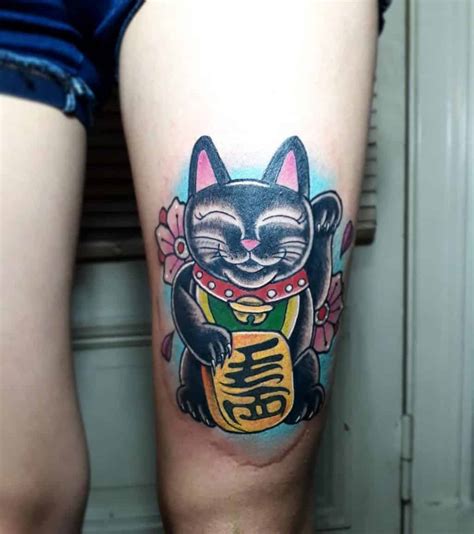 Maneki Neko Tattoos Explained: Origins, Meanings & Symbols