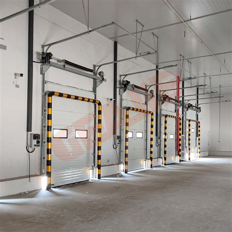 Factory Direct Sale Steel Sectional Industrial Warehouse Vertical Lift