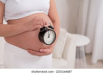 Pregnant Woman Naked Belly Holds Alarm Stock Photo Shutterstock