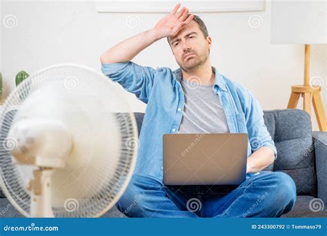 One Man Sweating Suffering Summer Heatwave At Home Stock Photo Image